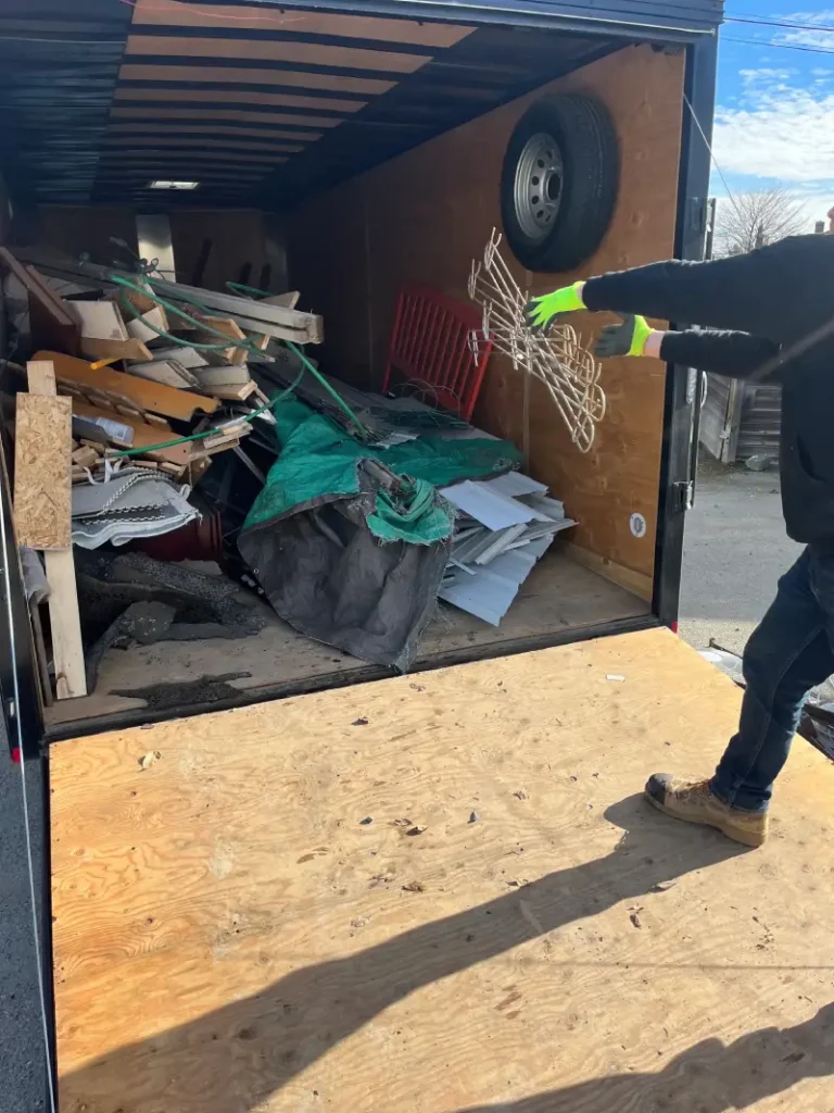 junk removal truck loaded with items while clearing out a parent's house in Kamloops BC