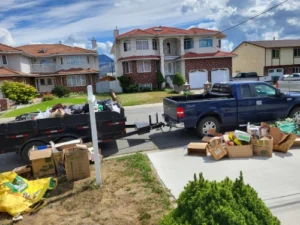 homeowner sorting through boxes of items during a decluttering project