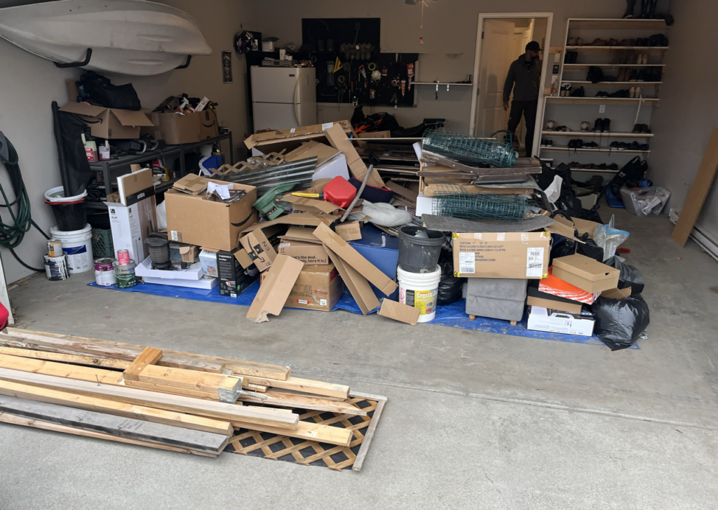 room filled with boxes and furniture ready for estate cleanout in Kamloops BC