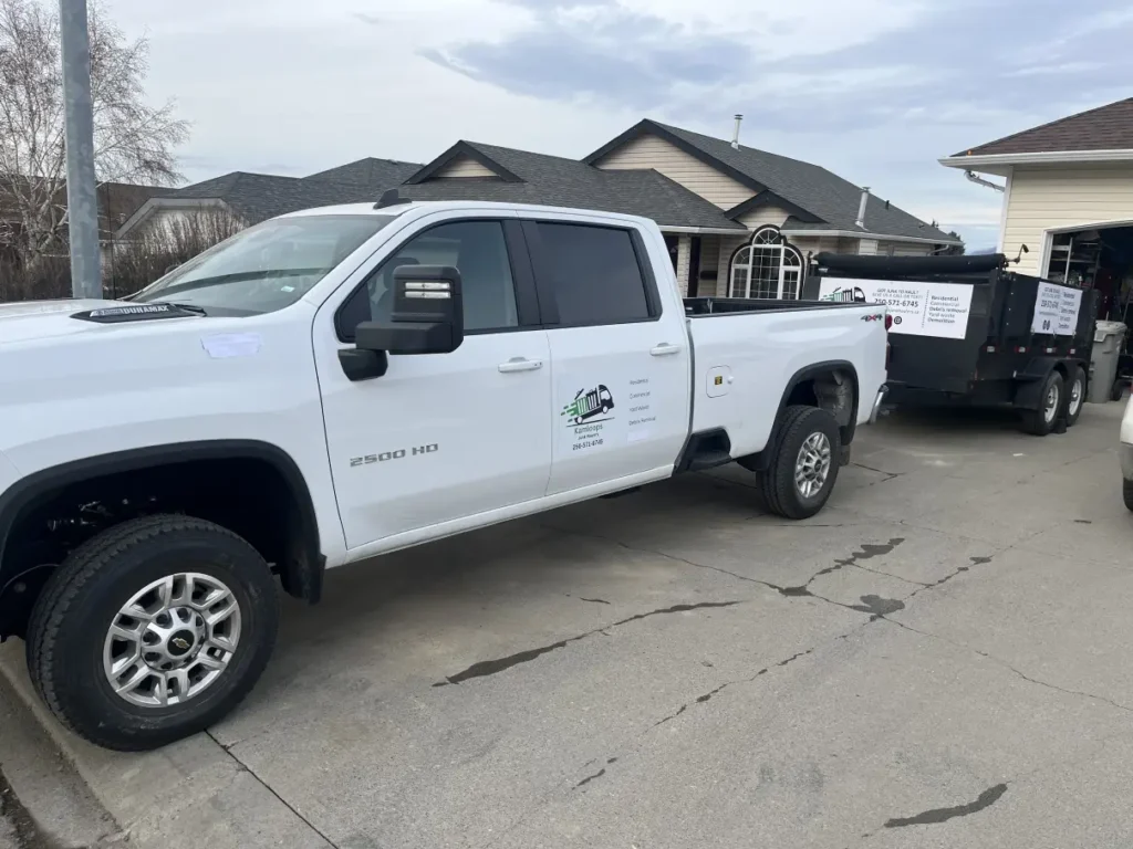 same day junk removal Kamloops truck arriving at residential home with crew ready to load
