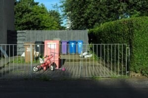 roll-off bin rental container sitting in residential driveway in Kamloops BC